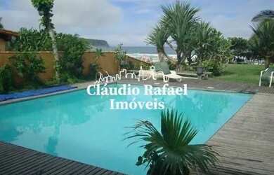 Imagem: A casa possui 4 Dormitórios, 5 Banheiros, 4 Vagas na garagem