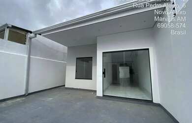 Imagem: A casa possui 2 Dormitórios, 1 Banheiro, 2 Vagas na garagem