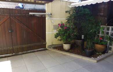 Imagem: A casa em condomínio possui 3 Dormitórios, 3 Banheiros, 2