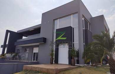 Imagem: A casa em condomínio possui 4 Dormitórios, 5 Banheiros, 4