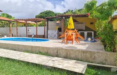 Imagem: A casa em condomínio possui 4 Dormitórios, 3 Banheiros, 5