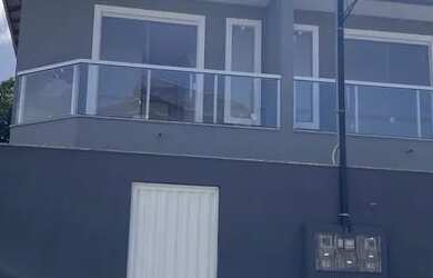 Imagem: A casa possui 2 Dormitórios, 3 Banheiros, 2 Vagas na garagem