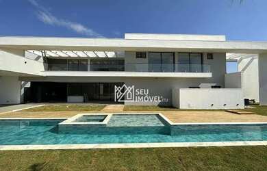 Imagem: A casa em condomínio à venda possui 5 Dormitórios, 5 Banheiros