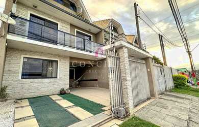 Imagem: A casa possui 4 Dormitórios, 3 Banheiros, 3 Vagas na garagem