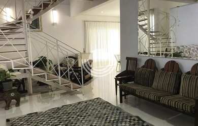 Imagem: A casa possui 3 Dormitórios, 4 Banheiros, 4 Vagas na garagem