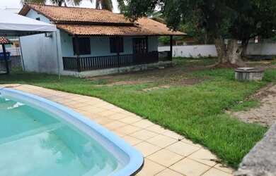 Imagem: A casa possui 5 Dormitórios, 4 Banheiros e 5 Vagas na garagem