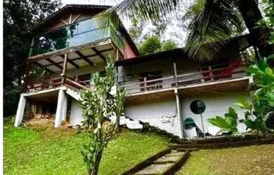 Imagem: A casa possui 3 Dormitórios, 4 Banheiros, 4 Vagas na garagem