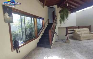 Imagem: A casa possui 3 Dormitórios, 4 Banheiros, 4 Vagas na garagem