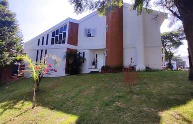 Imagem: A casa em condomínio possui 4 Dormitórios, 4 Banheiros, 4