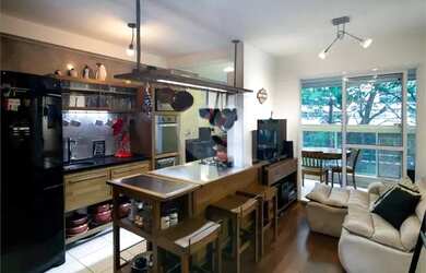 Imagem: O apartamento possui 2 Dormitórios, 1 Banheiro, 1 Vaga na garagem