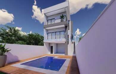 Imagem: A casa possui 3 Dormitórios, 3 Banheiros, 2 Vagas na garagem