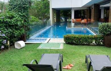 Imagem: A casa em condomínio possui 4 Dormitórios, 5 Banheiros, 2