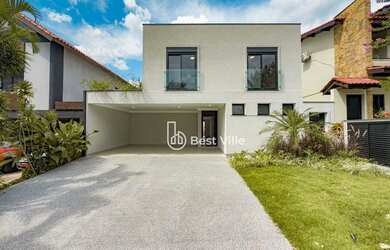 Imagem: A casa em condomínio possui 4 Dormitórios, 5 Banheiros, 4