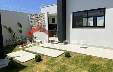 Imagem: A casa possui 3 Dormitórios, 3 Banheiros, 4 Vagas na garagem