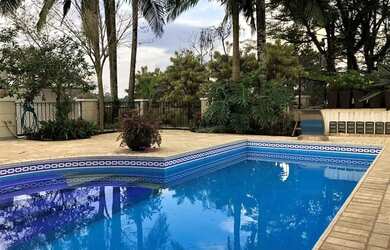 Imagem: A casa em condomínio possui 4 Dormitórios, 5 Banheiros, 4