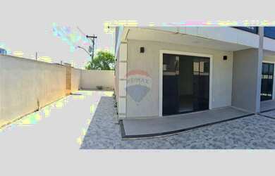 Imagem: A casa possui 2 Dormitórios, 3 Banheiros, 2 Vagas na garagem