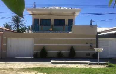 Imagem: A casa possui 4 Dormitórios, 1 Vaga na garagem, Churrasqueira