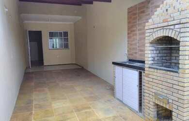 Imagem: A casa possui 2 Dormitórios, 3 Banheiros, 2 Vagas na garagem