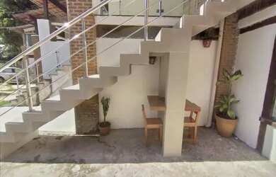 Imagem: A casa possui 2 Dormitórios, 2 Vagas na garagem e está localizado