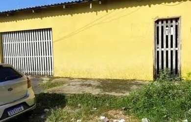 Imagem: A casa possui 3 Dormitórios, 2 Banheiros, 2 Vagas na garagem