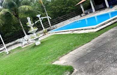 Imagem: A casa possui 5 Dormitórios, 5 Banheiros, 5 Vagas na garagem