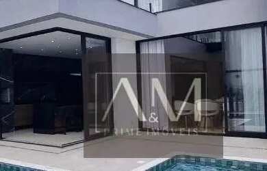 Imagem: A casa em condomínio possui 4 Dormitórios, 5 Banheiros, 4