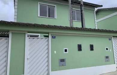 Imagem: A casa possui 2 Dormitórios, 1 Banheiro, 2 Vagas na garagem