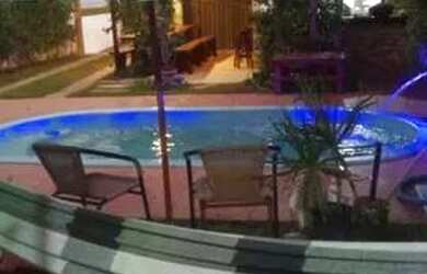 Imagem: A casa possui 3 Dormitórios, 3 Vagas na garagem e está localizado