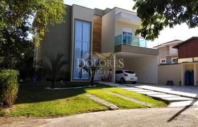 Imagem: A casa em condomínio possui 3 Dormitórios, 3 Banheiros, 340m²