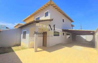 Imagem: A casa possui 3 Dormitórios, 3 Banheiros, 4 Vagas na garagem