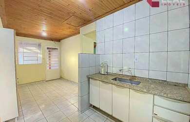 Imagem: A casa à venda possui 2 Dormitórios, 1 Banheiro, 2 Vagas na