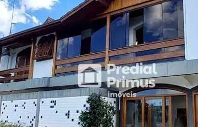 Imagem: A casa possui 5 Dormitórios, 5 Banheiros, 3 Vagas na garagem