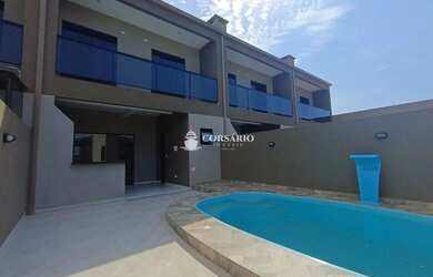 Imagem: A casa possui 3 Dormitórios, 3 Banheiros, 2 Vagas na garagem