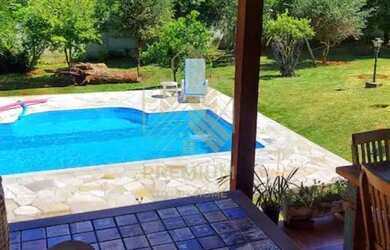 Imagem: A casa em condomínio possui 4 Dormitórios, 3 Banheiros, 5