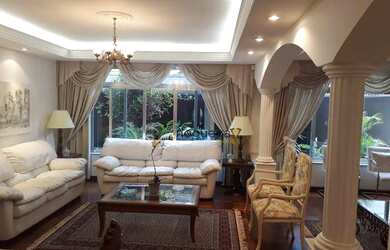 Imagem: A casa possui 5 Dormitórios, 5 Banheiros, 5 Vagas na garagem