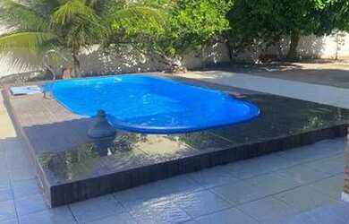 Imagem: A casa possui 4 Dormitórios, 5 Banheiros, 5 Vagas na garagem