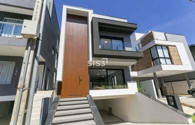 Imagem: A casa em condomínio possui 3 Dormitórios, 5 Banheiros, 2