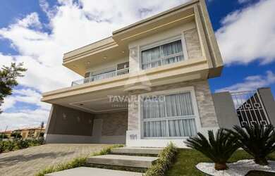Imagem: A casa em condomínio possui 4 Dormitórios, 4 Banheiros, 2