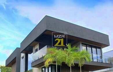 Imagem: A casa em condomínio possui 4 Dormitórios, 5 Banheiros, 4