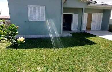 Imagem: A casa possui 5 Dormitórios, 3 Banheiros, 4 Vagas na garagem