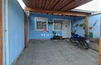 Imagem: A casa possui 2 Dormitórios, 1 Banheiro, 1 Vaga na garagem