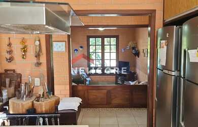 Imagem: A casa em condomínio possui 4 Dormitórios, 5 Banheiros, 3