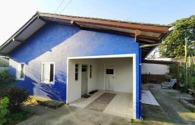 Imagem: A casa possui 2 Dormitórios, 1 Banheiro, 1 Vaga na garagem