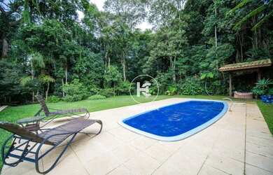 Imagem: A casa em condomínio possui 5 Dormitórios, 5 Banheiros, 5