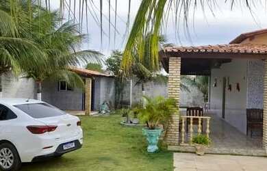 Imagem: A casa possui 3 Dormitórios, 5 Vagas na garagem e está localizado