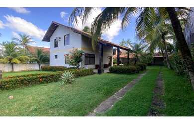 Imagem: A casa possui 4 Dormitórios, 5 Banheiros, 5 Vagas na garagem