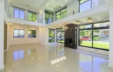 Imagem: A casa em condomínio possui 5 Dormitórios, 5 Banheiros, 4