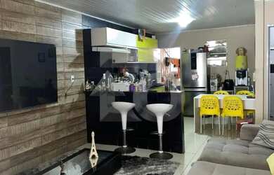 Imagem: A casa possui 3 Dormitórios, 2 Banheiros, 1 Vaga na garagem