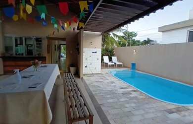 Imagem: A casa em condomínio possui 4 Dormitórios, 4 Banheiros, 2