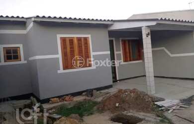 Imagem: A casa possui 3 Dormitórios, 2 Banheiros, 2 Vagas na garagem